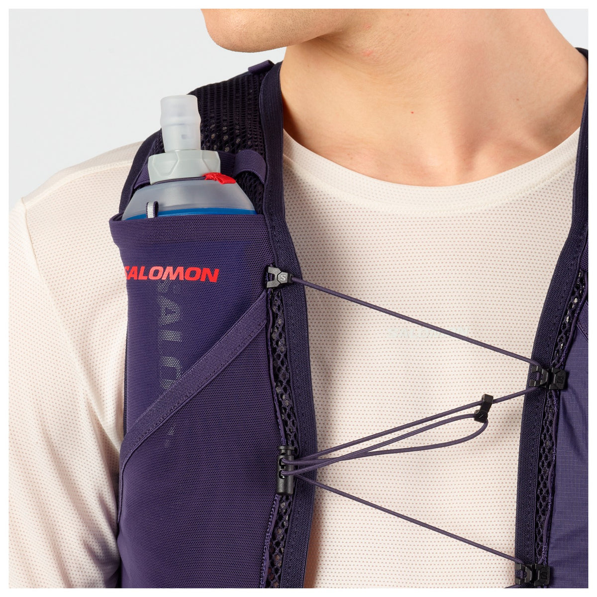 Chaleco de hidratación Salomon Active Skin 4 GRVL Morado, detalle de los bolsillos frontales
